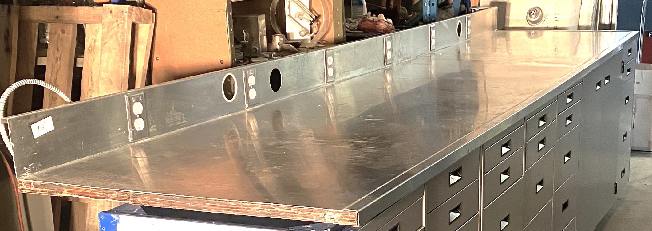 Used Stainless Steel Dished Worksurface with Electrical Outlets and Backsplash (12-ft)