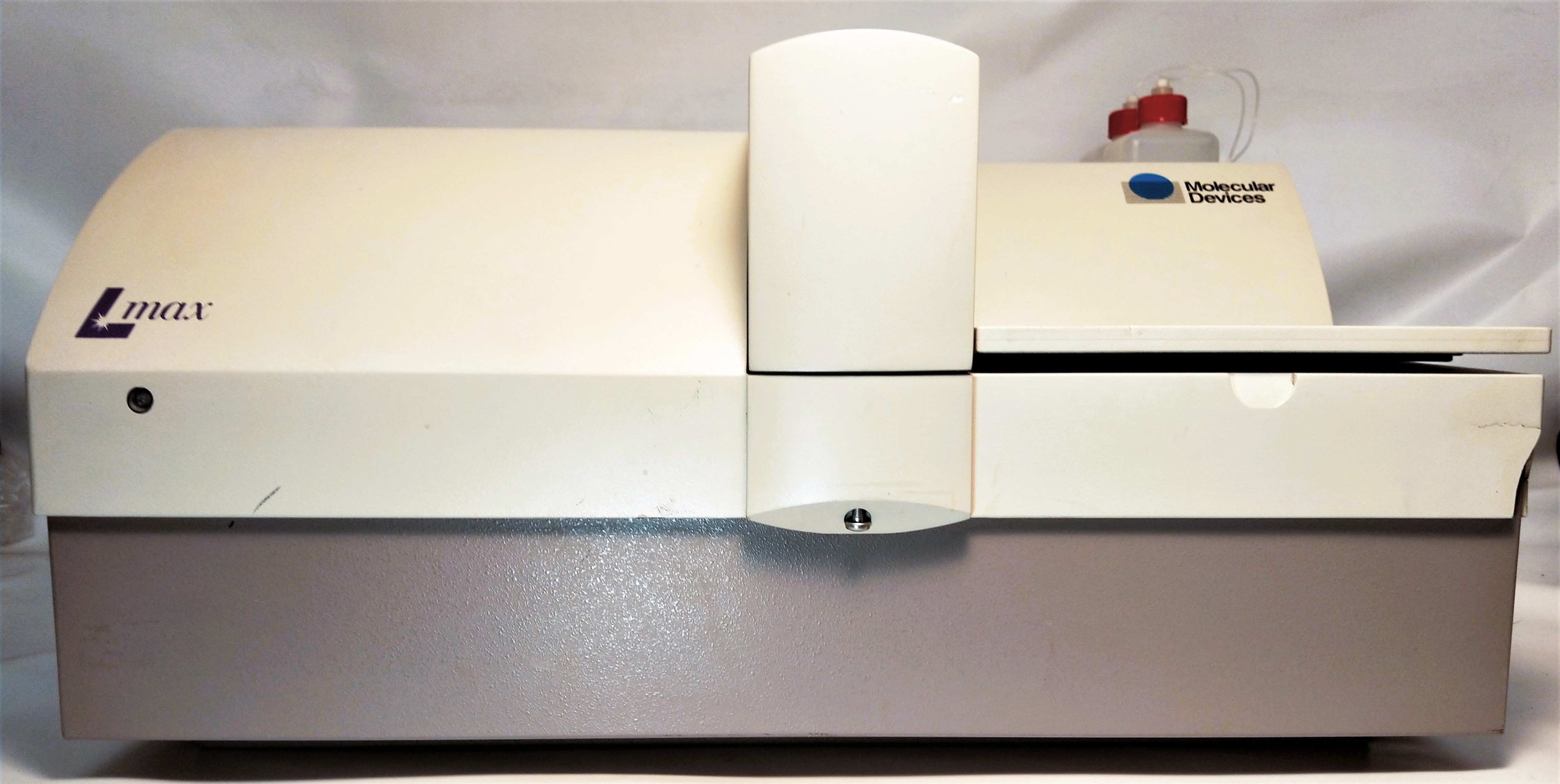 As is Molecular Devices L-Max Microplate Reader