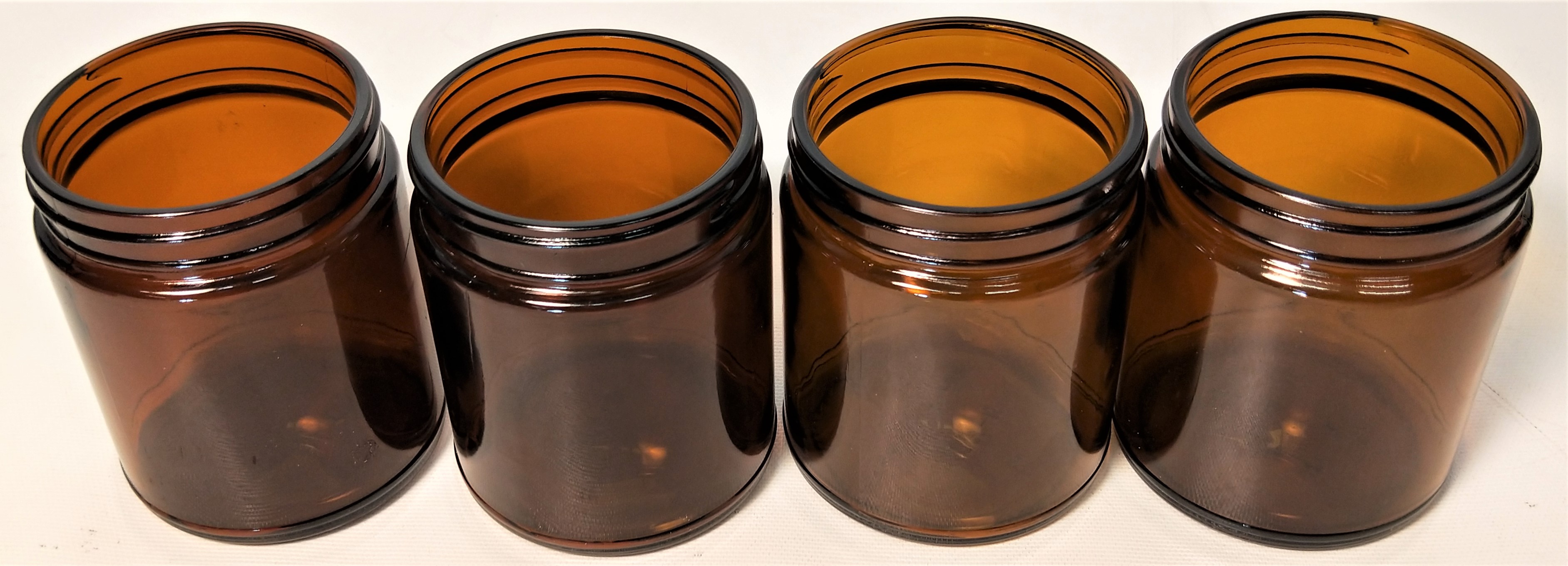 New Open Box Lot of Amber Glassware and Plasticware - Bottles and Jars