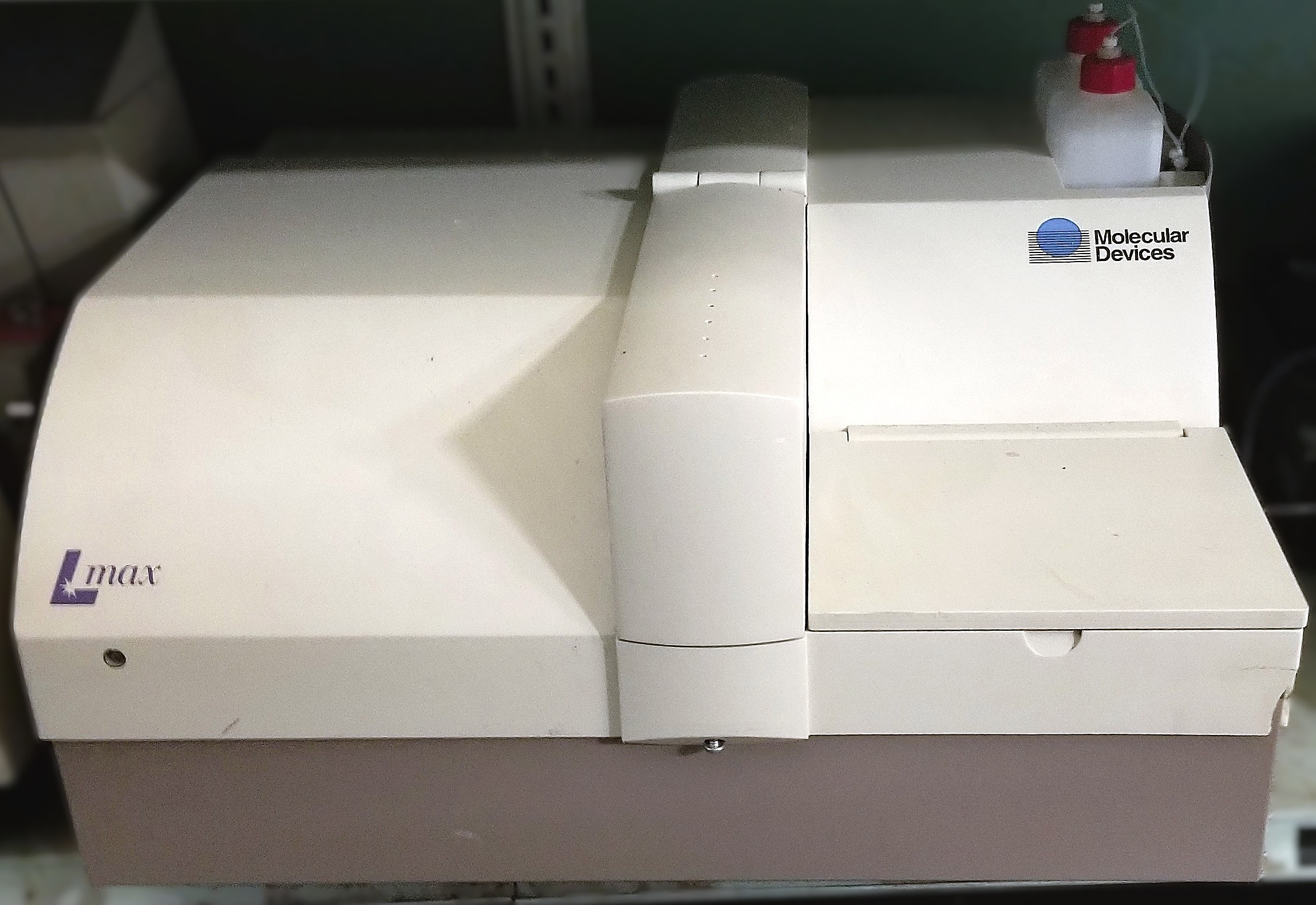 As is Molecular Devices L-Max Microplate Reader