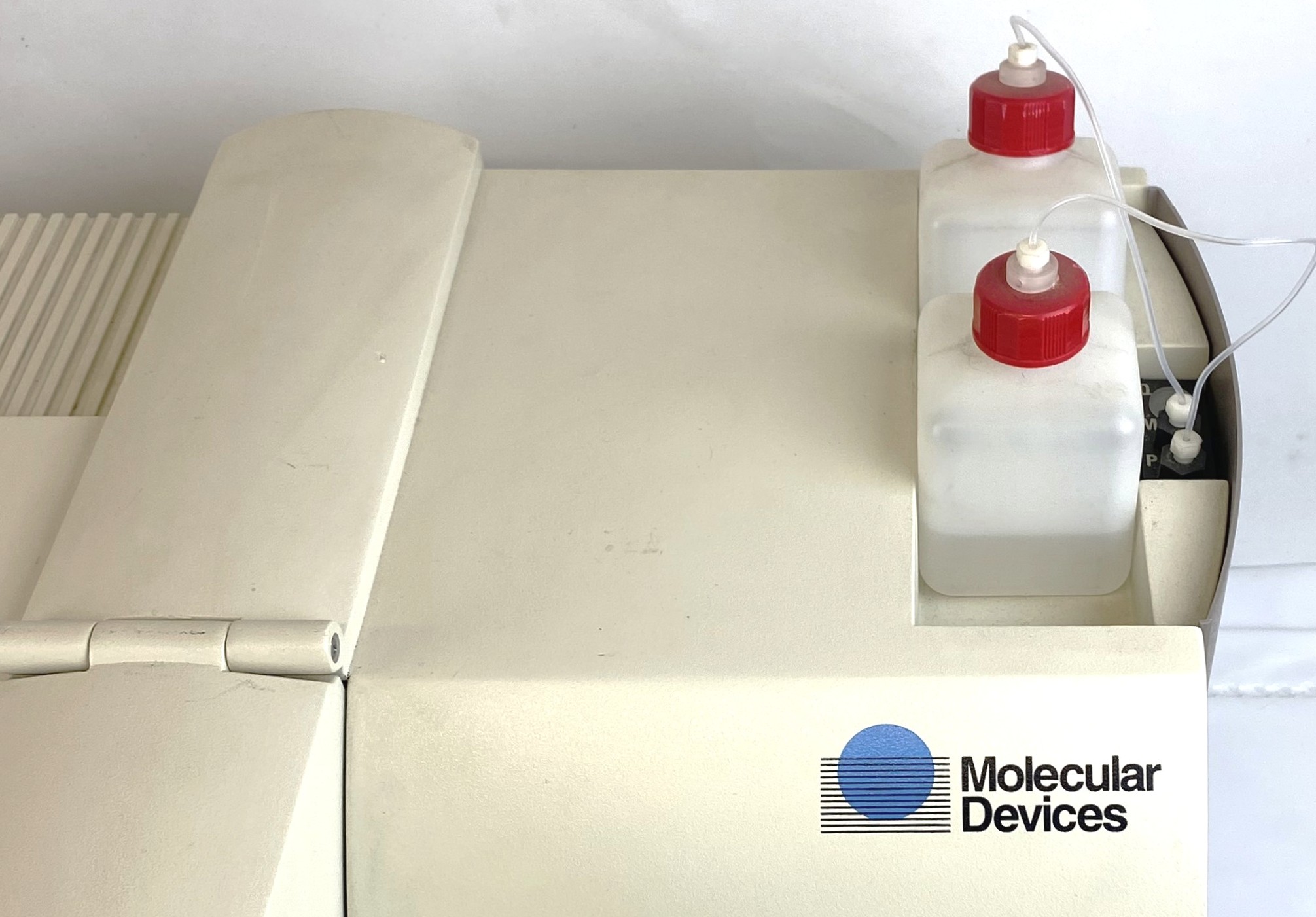 As is Molecular Devices L-Max Microplate Reader