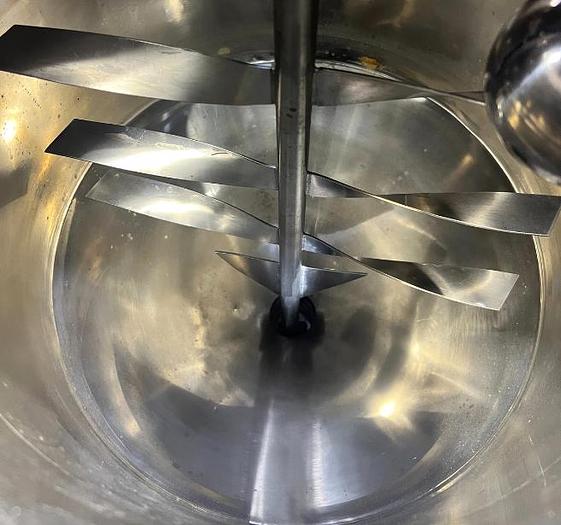 D'occasion Semi-automatic piston filler with heated hopper and agitator