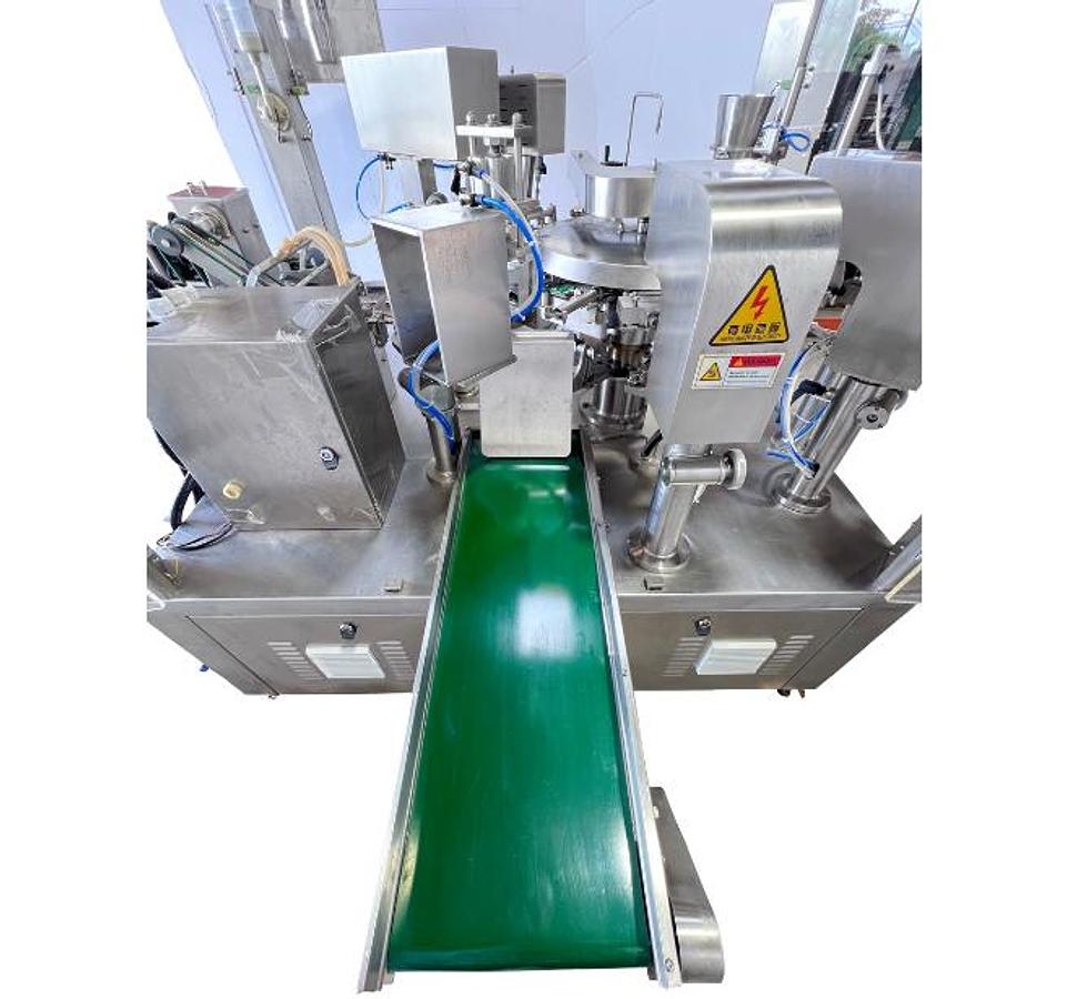 D'occasion MINGBO MB8-200C Remplisseuse / Scelleuse  à sachets rotative automatique