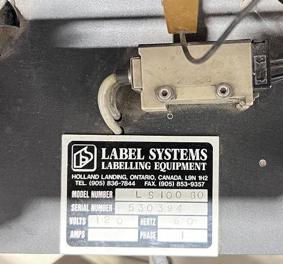 D'occasion LABEL SYSTEMS LS 100 80 - Étiqueteuse à sceau de sécurité automatique