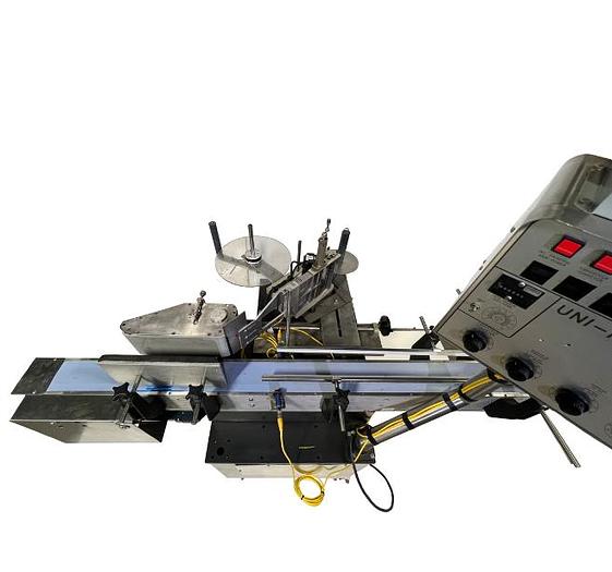 D'occasion UNI-PHARMA - Étiqueteuse automatique