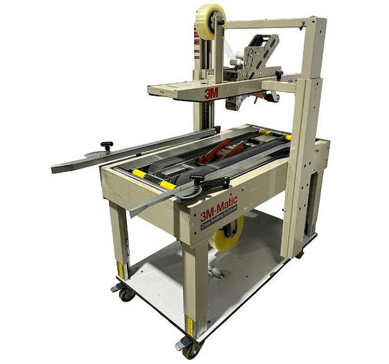 D'occasion 3M-Matic 22A - Tapeuse/scelleuse à boîtes semi-automatique dessus & dessous