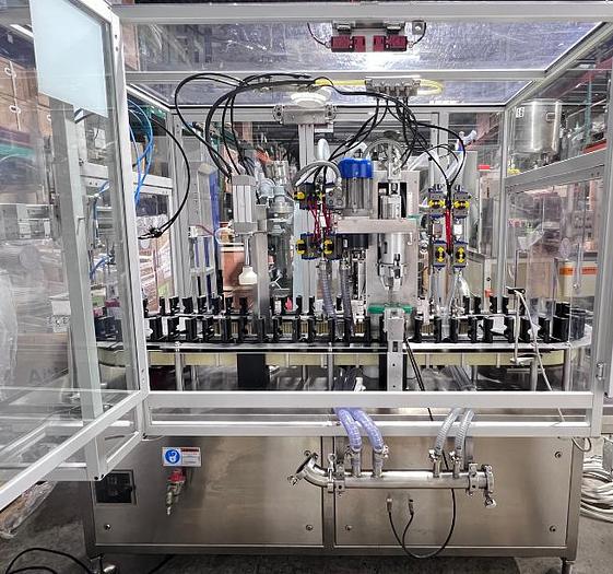 Used COMAS RTS4 - Remplisseuse 4 buses automatique avec tête de vissage & station de pressage