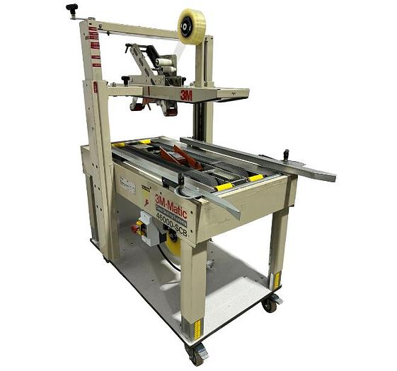 D'occasion 3M-Matic 22A - Tapeuse/scelleuse à boîtes semi-automatique dessus & dessous