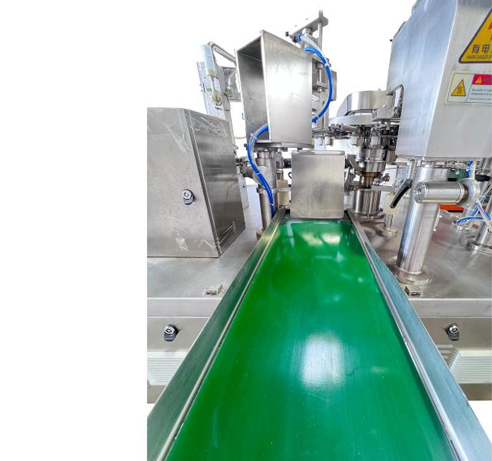 D'occasion MINGBO MB8-200C Remplisseuse / Scelleuse  à sachets rotative automatique