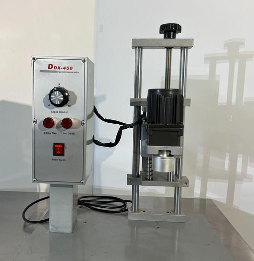 D'occasion DDX - 450 - Bouchonneuse de table semi-automatique