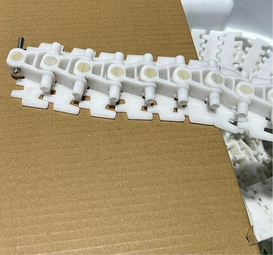 D'occasion mk North America, Inc. VERSAFLEX A08 - Convoyeur à chaîne table top flexible verticale 