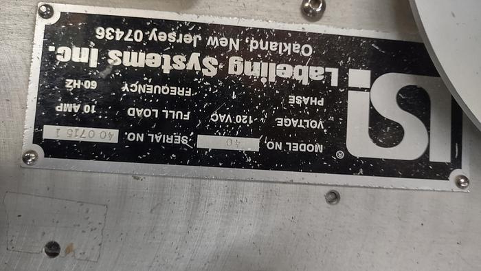 Used LSI model 1400 wrap pressure sensitive labeler