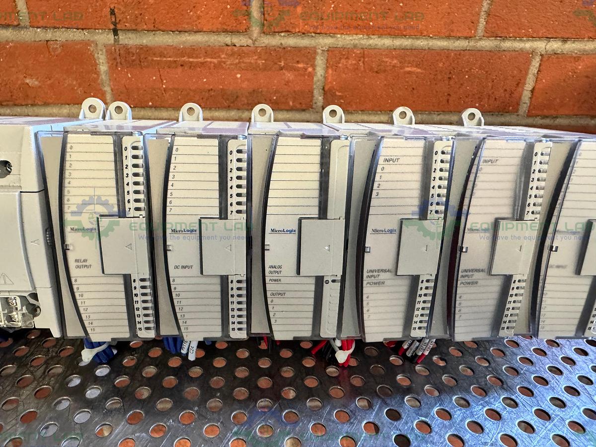 Used Allen Bradley Micrologix 1400 Controller w/ 2- 1762-IQ16, 1762-OF4,1762-OW16