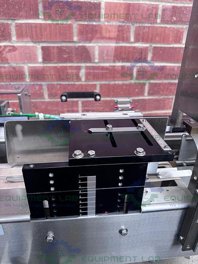 Used Econoseal E System 2000 Econoseal Cartoner w/ Hot Glue Sealing