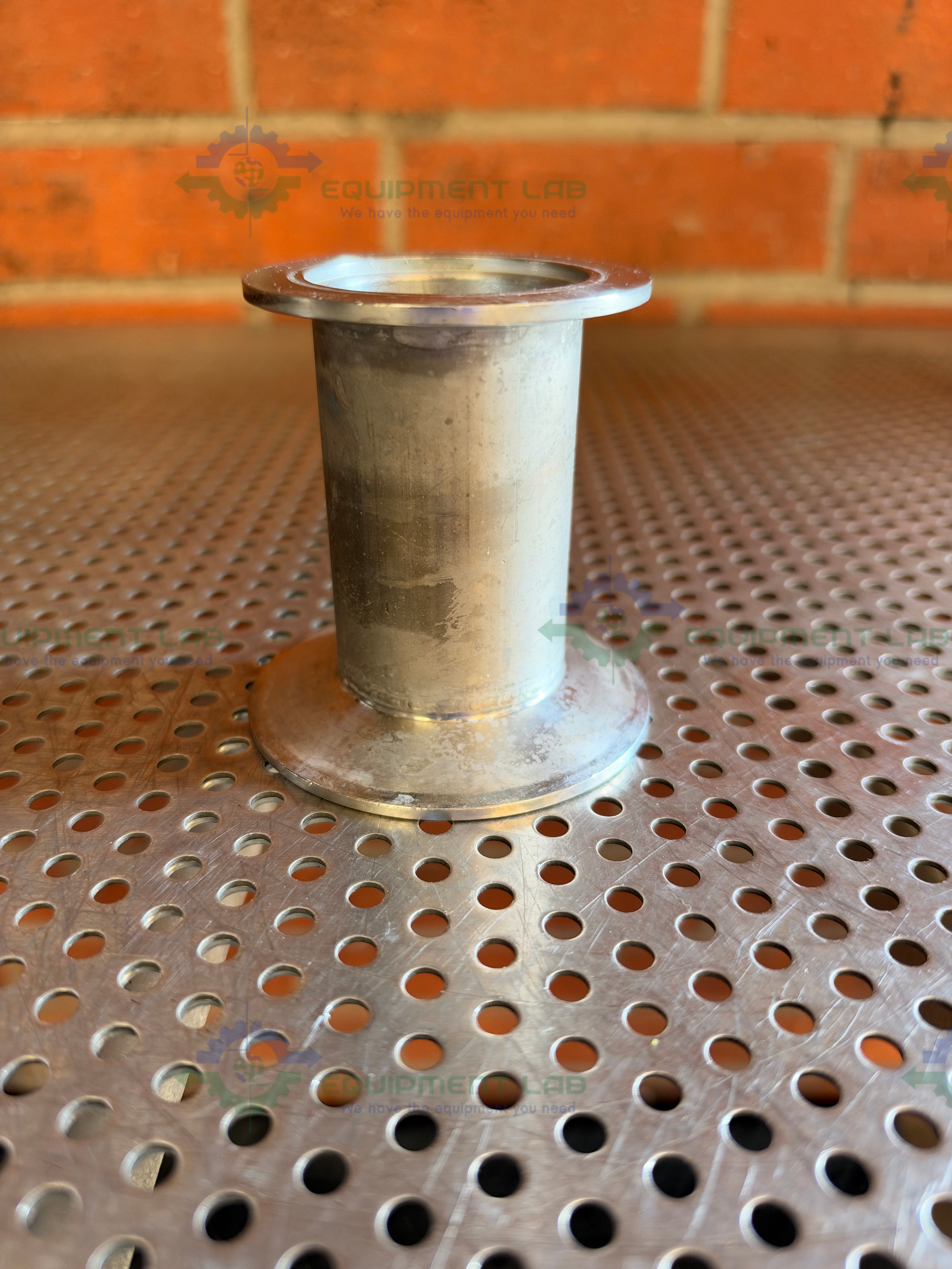 Used Stainless Steel Vacuum Reducer  KF 50 to 3.5" OD Sanitary Fitting