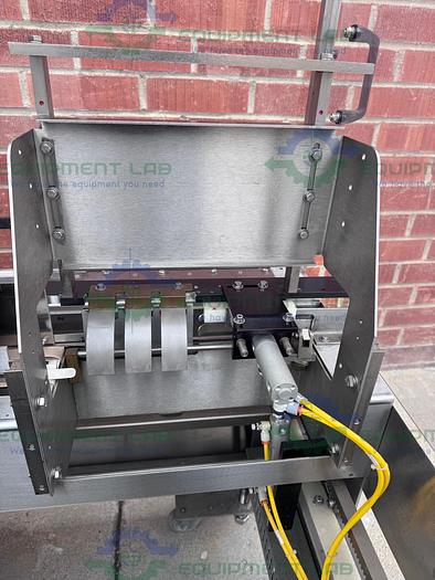 Used Econoseal E System 2000 Econoseal Cartoner w/ Hot Glue Sealing