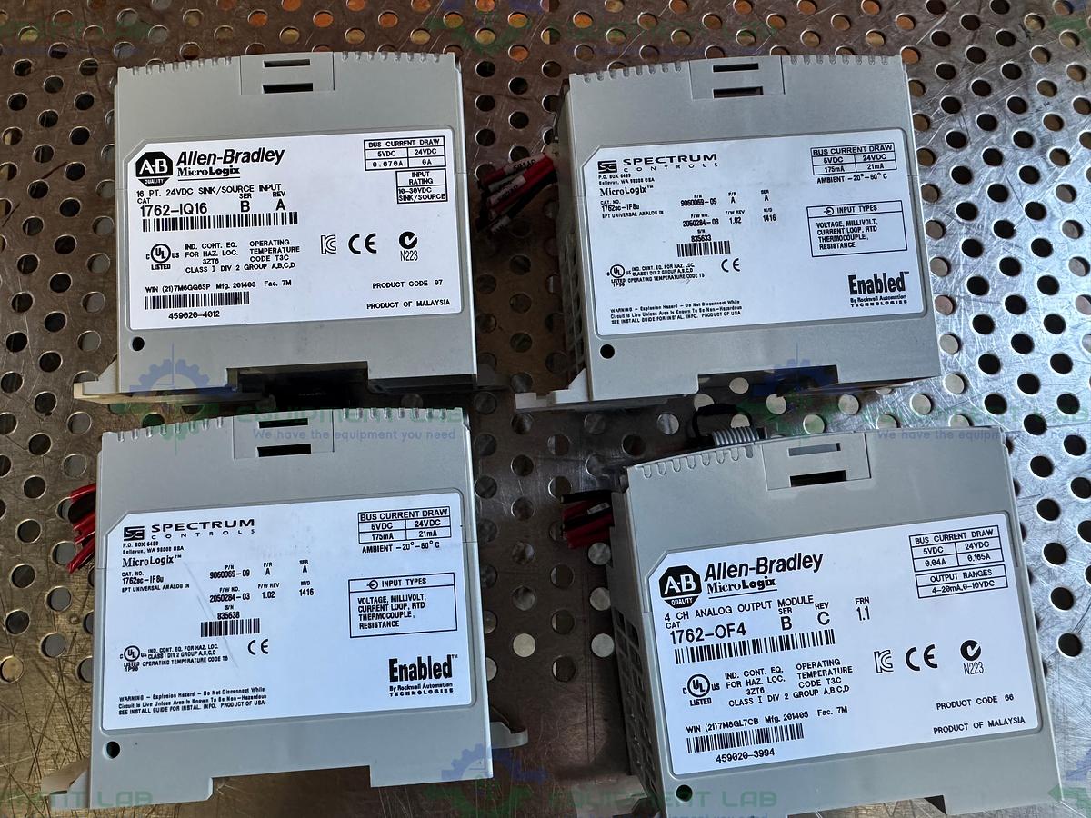 Used Allen Bradley Micrologix 1400 Controller w/ 2- 1762-IQ16, 1762-OF4,1762-OW16