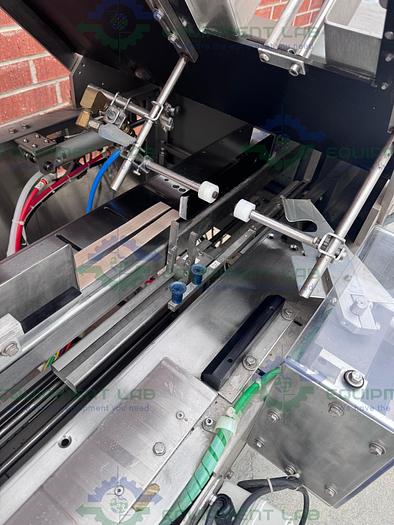 Used Econoseal E System 2000 Econoseal Cartoner w/ Hot Glue Sealing