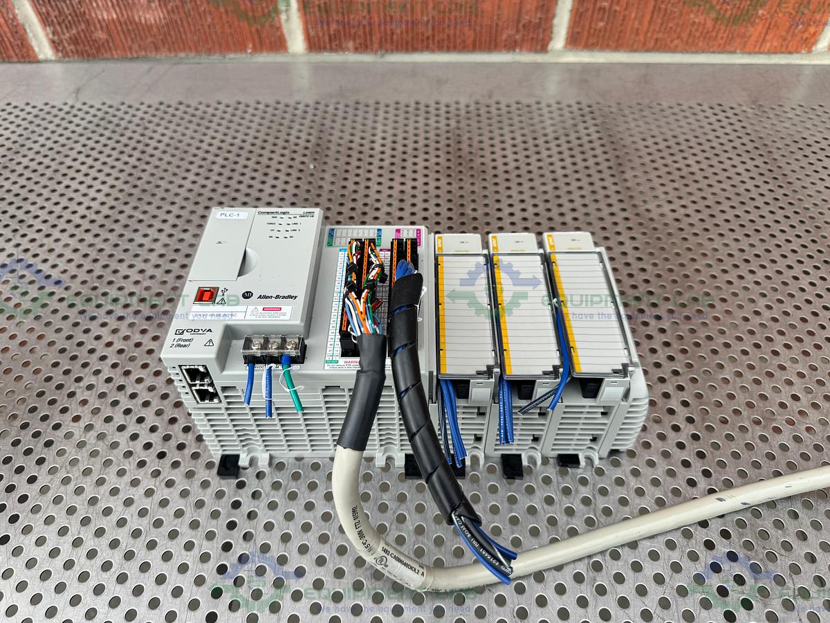 Used Allen Bradley Compact Logix L24ER QBFC1B Controller w/ 1769-OF4 Compact I/O