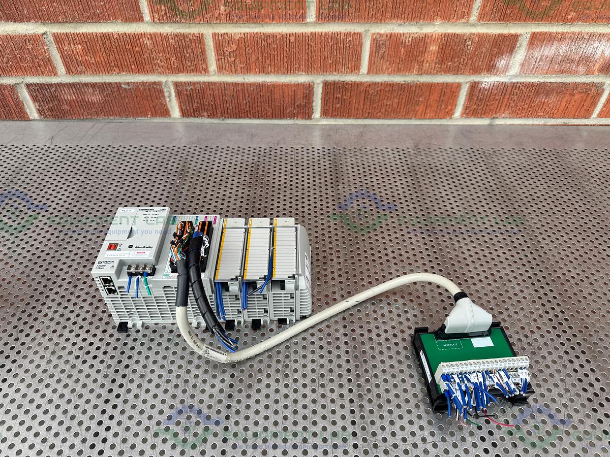 Used Allen Bradley Compact Logix L24ER QBFC1B Controller w/ 1769-OF4 Compact I/O