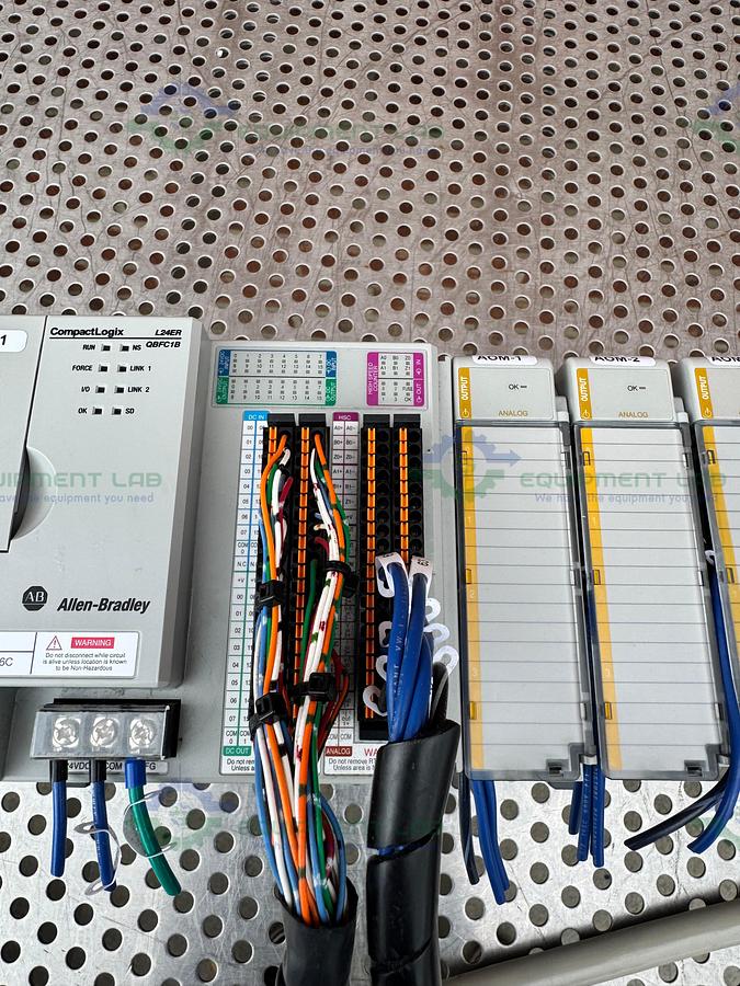 Used Allen Bradley Compact Logix L24ER QBFC1B Controller w/ 1769-OF4 Compact I/O