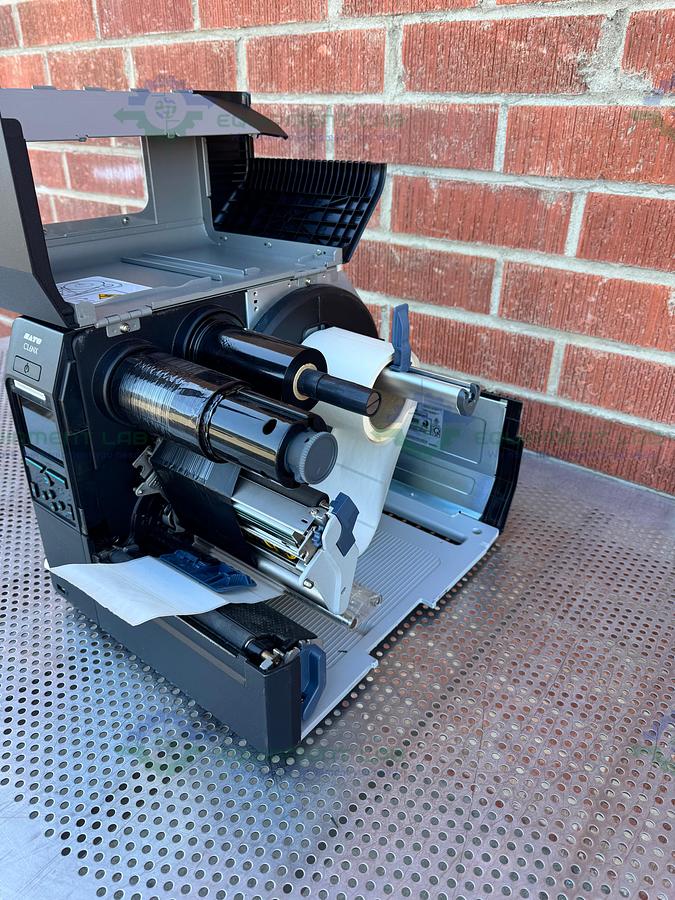 Used Sato CL6NX Thermal Barcode Label Printer 100-240V, 50-60 Hz