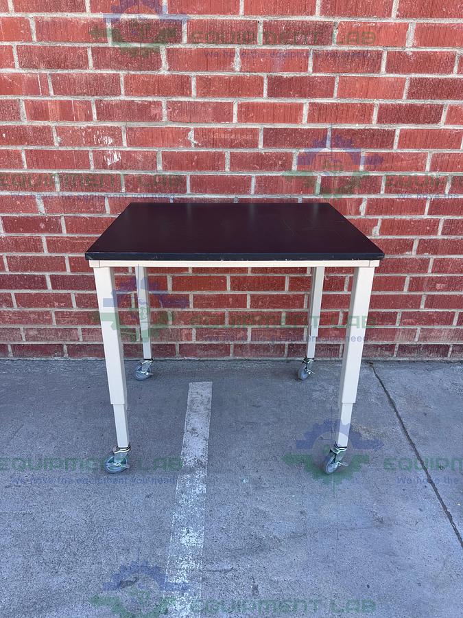 Used Phenolic / Composite  Resin Adjustable  Science Table with Wheels-30" W x 36" L