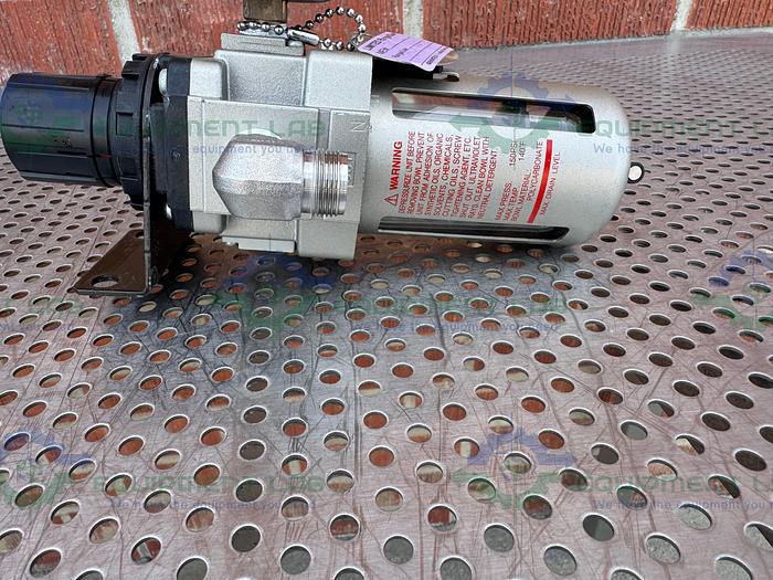Used SMC AW40-N04-Z Filter Regulator 7 - 125 PSI w/ Flowserve Ball Valve