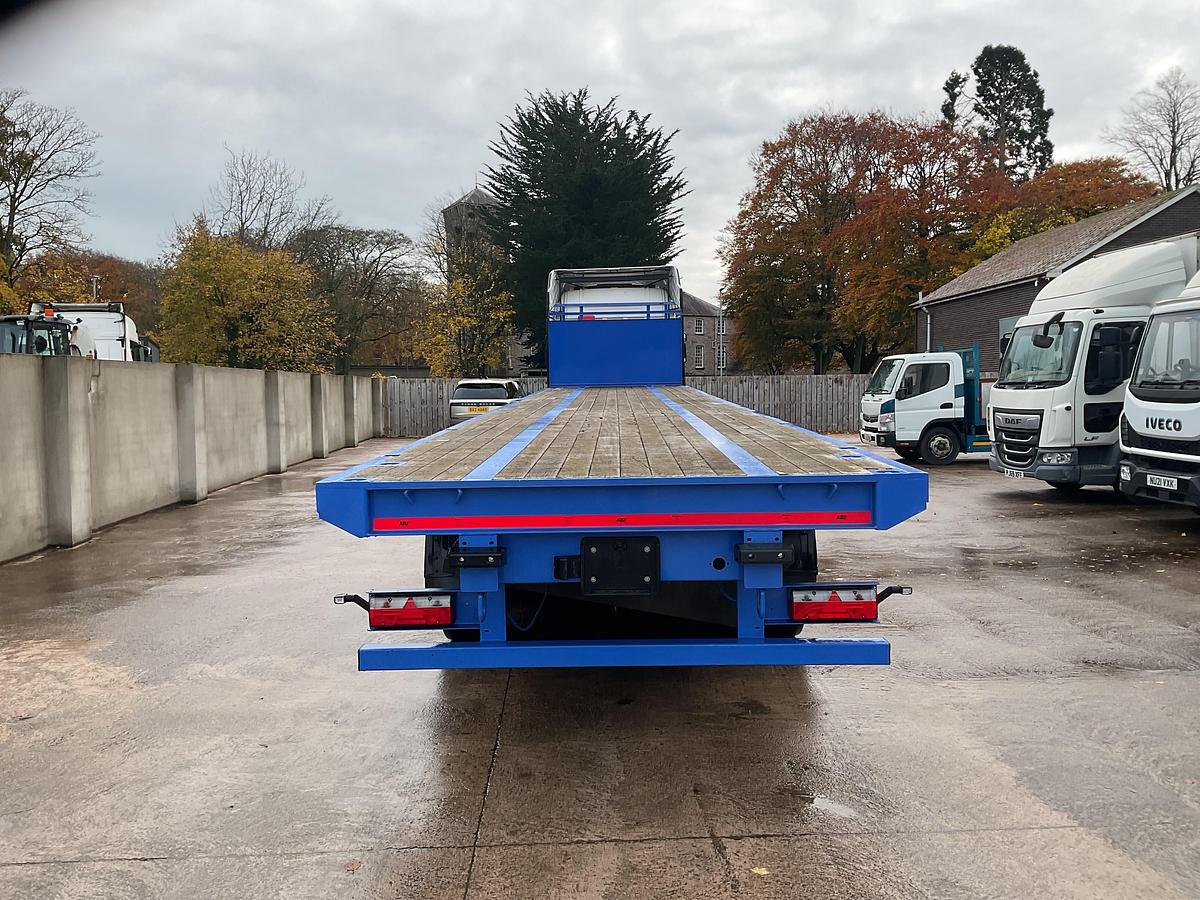 Used 2018 Dennison Tri axle Flat Trailer