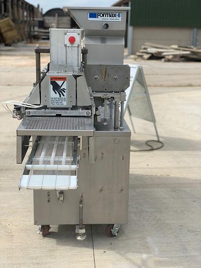 Used 2009 Formax F-6 former with Tender-Form fill system