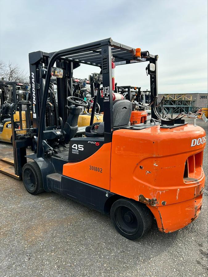 “2018 Doosan GC45S‑5 rear side angle – counterweight and LPG system – 10,000 lb cushion forklift”