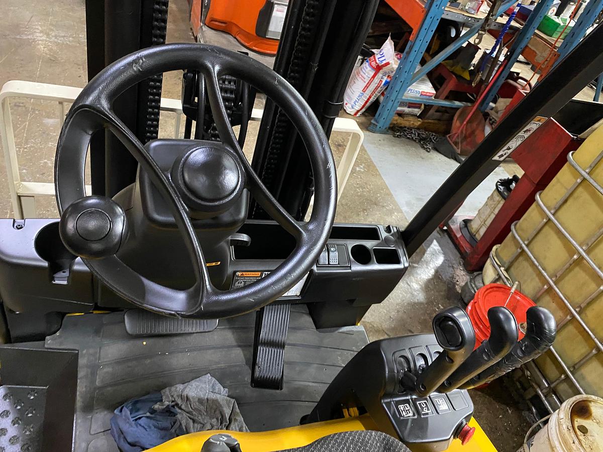 Steering wheel view showing operator controls and CSA dashboard