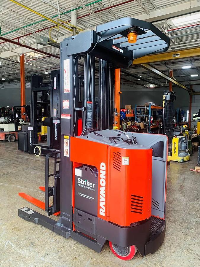 Side view of Budget Raymond EASIDR25TT deep‑reach forklift, non‑CSA.