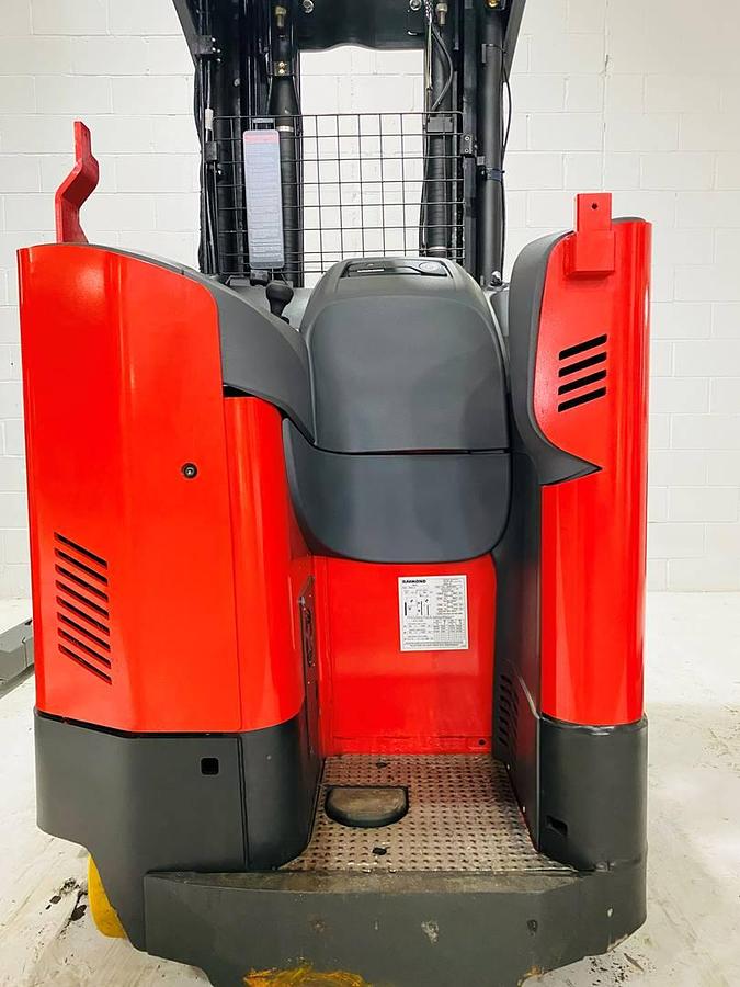 Operator compartment of 2022 Raymond 752-R45TT freezer reach truck showing forward-facing stance, deadman pedal, and ergonomic control layout – CSA certified unit in Brampton ON