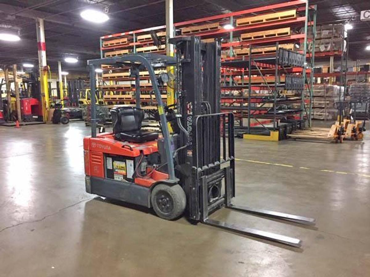 2012 Toyota 7FBEU18 electric 3-wheel forklift with CSA certification deployed in Brampton for indoor warehouse operations and narrow aisle maneuvering