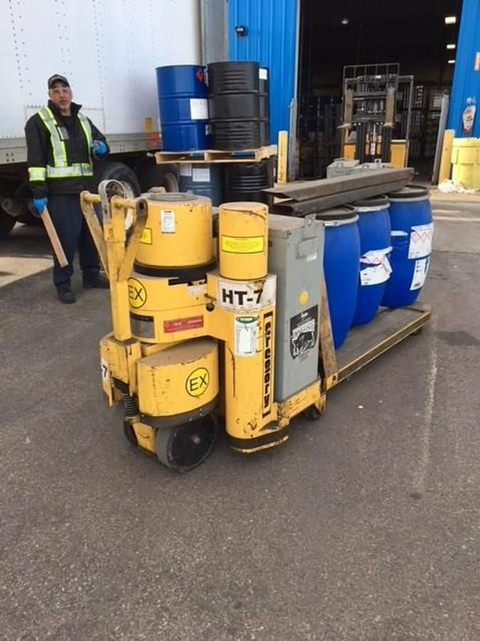 Rear side view of refurbished 2008 Gregory WP10EX explosion‑proof EX rated walkie power pallet truck showing rear chassis, EX rated battery compartment, and CSA certification decal during Ontario deployment.