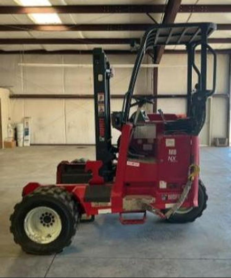 Side view of refurbished 2016 Moffett M8 55.3NX — 120" lift height, 96" lowered height, truck‑mounted design