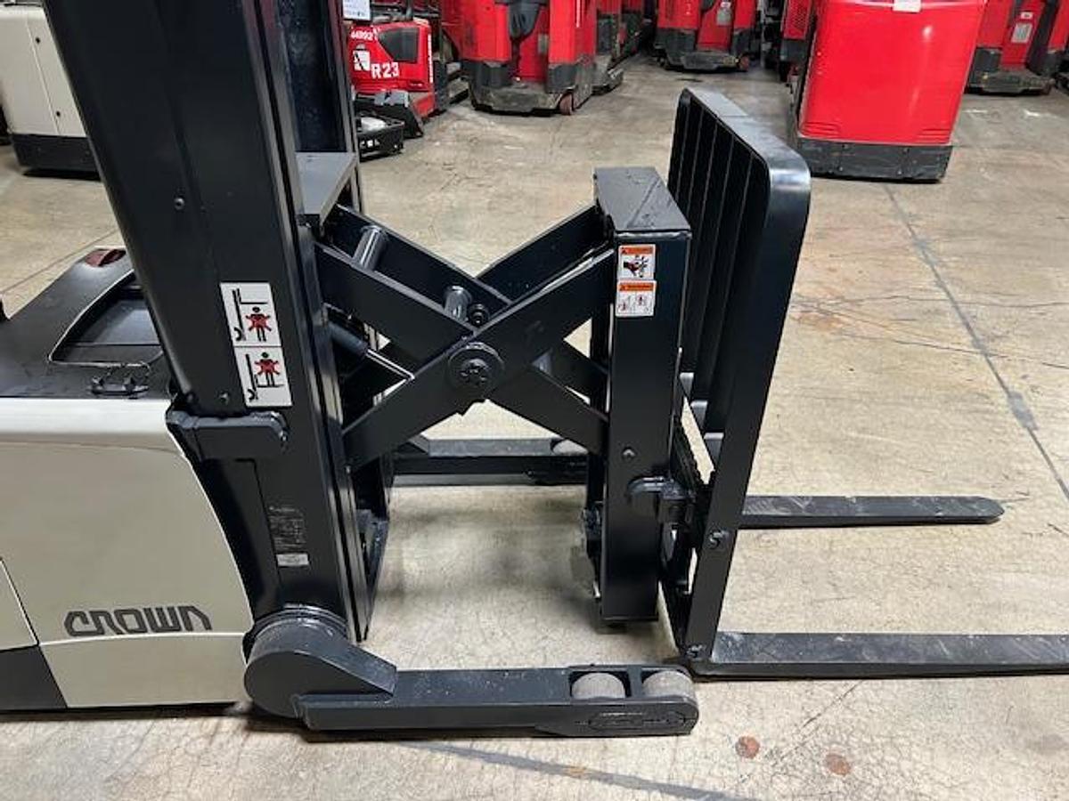 Crown SHR5540-35 – side view with forks extended – pantograph reach carriage, triple mast, and straddle legs – CSA walkie reach stacker – Brampton ON