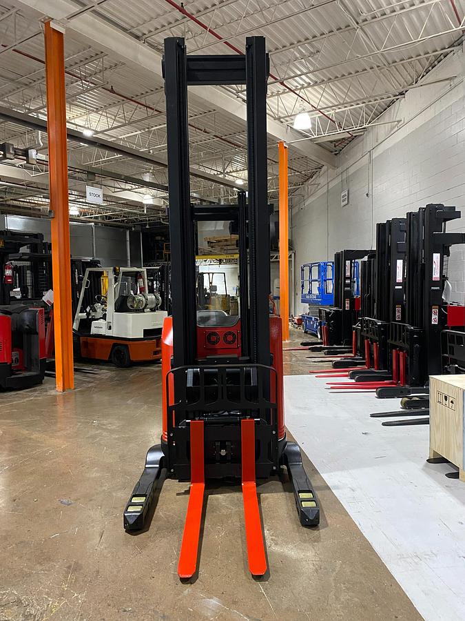 Front view of 2022 Raymond 752-DR32TT deep reach forklift showing triple-stage mast, 42” forks, 48” load backrest, and CSA-certified chassis – unit staged in Brampton ON