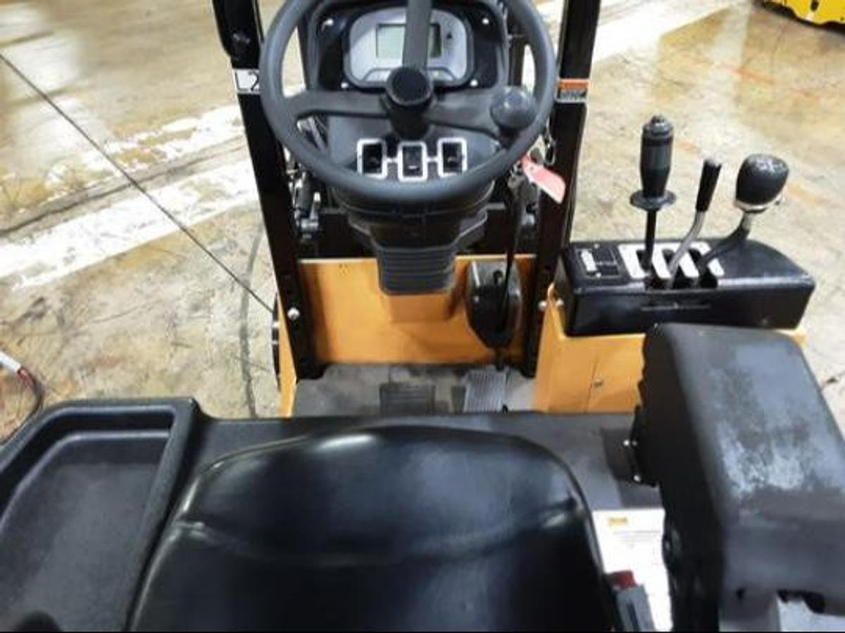 Operator compartment view of Bendi B40/48AC180D swing mast forklift – CSA-certified 4,000 lb sit-down forklift with ergonomic seat, Curtis display, fingertip hydraulic controls, and safety deadman switch – Premier Lift Equipment Brampton ON