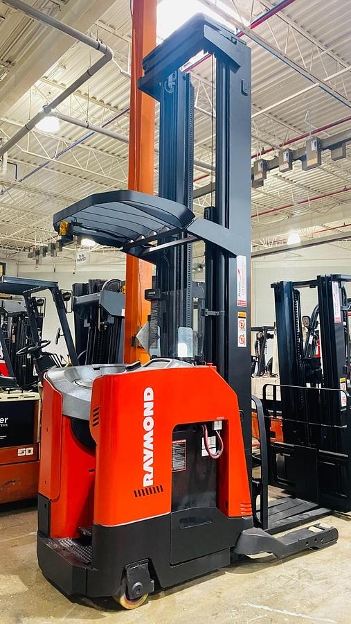 Opposite rear angle of Budget Raymond reach truck — counterweight, frame, and rear chassis detail.
