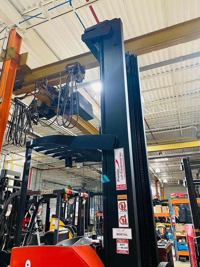 High mast with overhead guard and safety posts