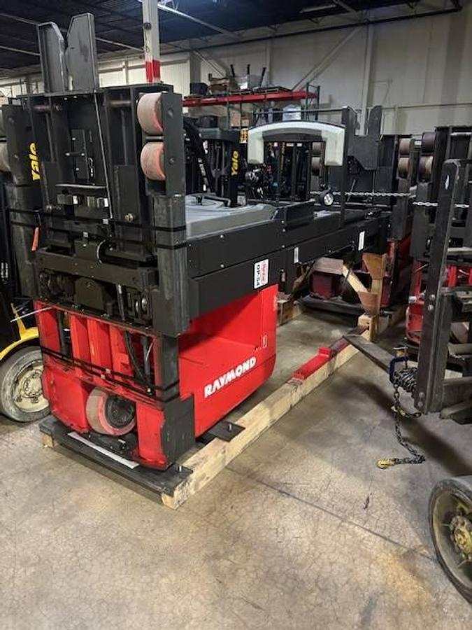 Raymond 550-OPC30TT WG – laid down cradled angle – triple mast and picker chassis secured for transport – CSA certified electric order picker – Brampton ON
