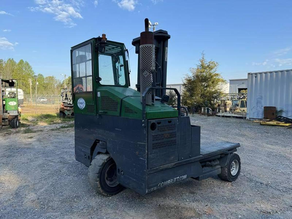 Rear side view of refurbished 2012 Combilift C10000XL LP Gas multi‑directional forklift showing rear chassis, LPG tank, and CSA certification decal during Ontario deployment.