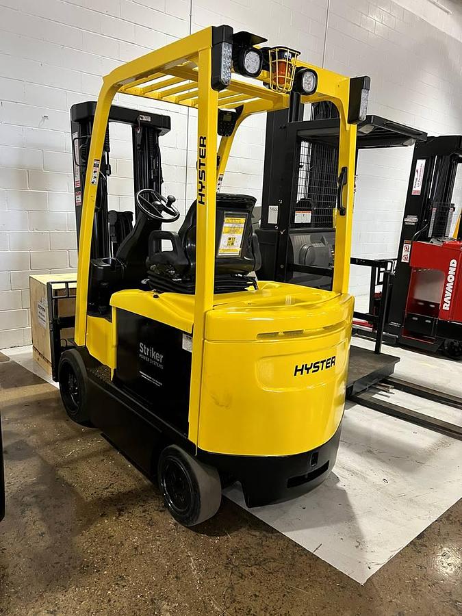 Hyster E60XN – passenger-side rear angle – counterweight, safety decals, and cushion tires – CSA electric forklift – Brampton ON