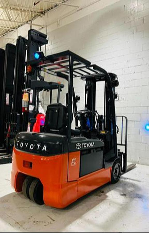 Rear side angle of refurbished 2023 Toyota 8FBE20U electric forklift showing counterweight, rear chassis, and CSA decal during Mississauga deployment