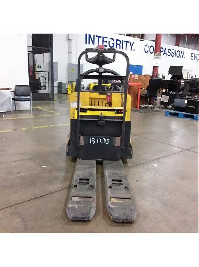 Front view of refurbished 2014 Yale MPB060 electric walkie pallet jack showing custom fork carriage, tips, and CSA certification decal during Ontario deployment