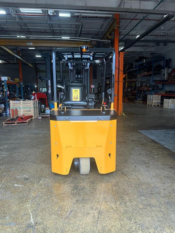 Rear view of Drexel SLT30AC forklift – showing counterweight panel, rear steer tire, CSA inspection tag, and battery compartment – Premier Lift Equipment Brampton ON