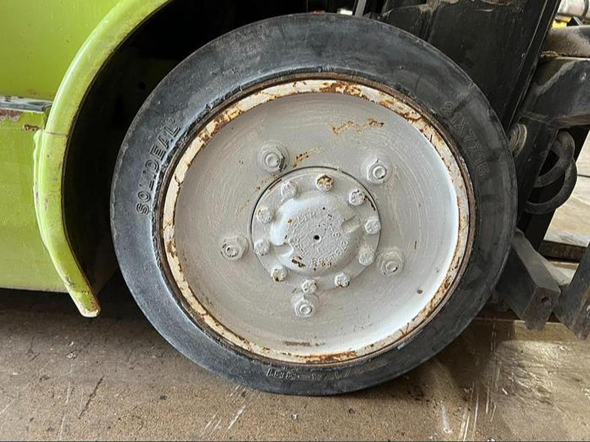 Right drive tire of Budget Clark CGC25 LPG cushion forklift, older non‑CSA unit.