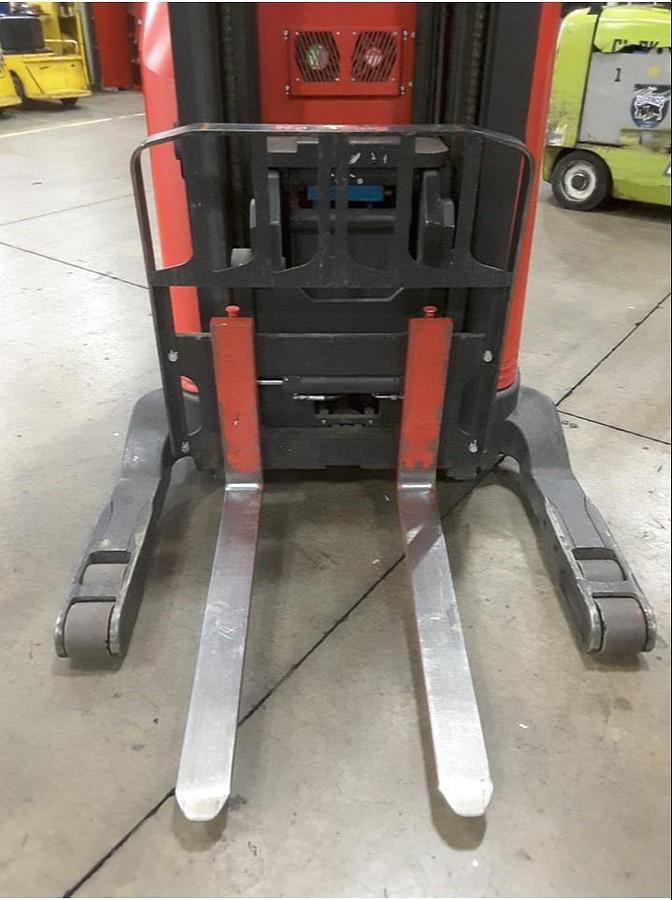 Front view of Raymond 750R45TT reach truck showing forks, single reach mast, and CSA certification decal during Brampton deployment